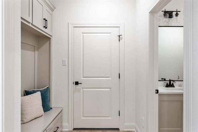 mudroom featuring a sink