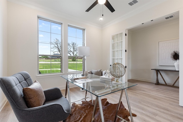 office featuring visible vents, a wealth of natural light, and wood finished floors