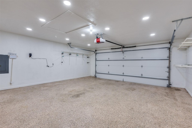 garage with recessed lighting, baseboards, and a garage door opener