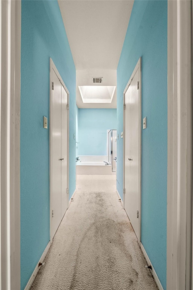 3133 Chimney Hill Dr, Waco, TX 76708 - hall with baseboards, light colored carpet, and visible vents