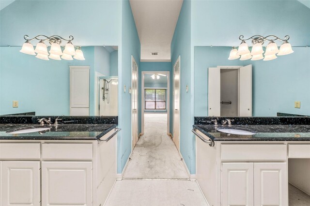 3133 Chimney Hill Dr, Waco, TX 76708 - full bath with a sink, visible vents, a shower stall, and two vanities