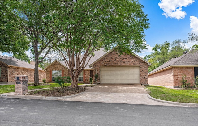 3133 Chimney Hill Dr, Waco, TX 76708 - traditional home with brick siding, a garage, and concrete driveway