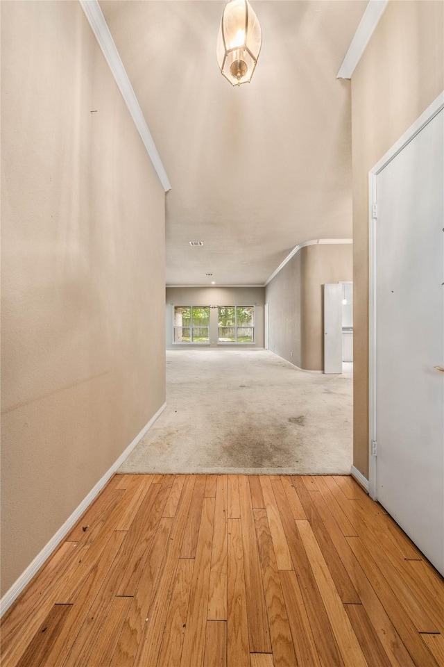 3133 Chimney Hill Dr, Waco, TX 76708 - carpeted foyer featuring crown molding, baseboards, and hardwood / wood-style floors
