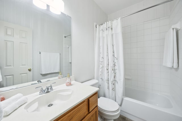 bathroom with vanity, toilet, and shower / tub combo