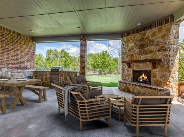 261 Chisholm Ranch Dr, Rockwall, TX 75032 - view of patio / terrace with area for grilling, grilling area, and an outdoor living space with a fireplace