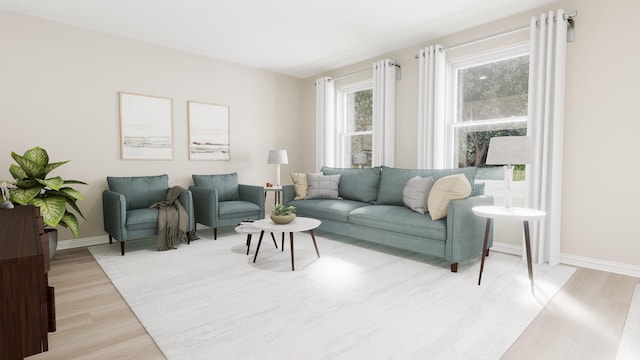 living room featuring baseboards and light wood-style floors