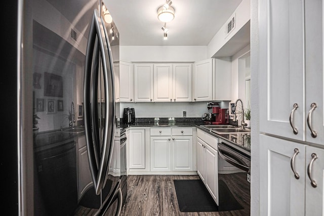 672 Harbor Dr, Azle, TX 76020 - kitchen featuring dishwashing machine, a sink, smart refrigerator, dark countertops, and white cabinetry