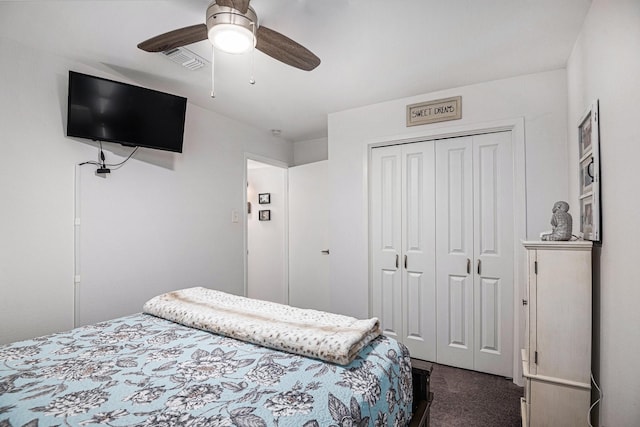 672 Harbor Dr, Azle, TX 76020 - bedroom featuring dark colored carpet, a closet, and a ceiling fan