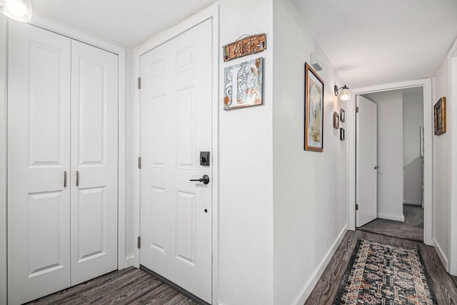 672 Harbor Dr, Azle, TX 76020 - hallway featuring dark wood-style floors and baseboards