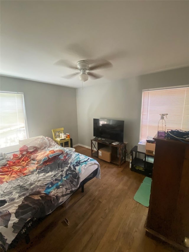 10721 Hermosa Dr, Dallas, TX 75218 - bedroom with a ceiling fan, baseboards, and wood finished floors