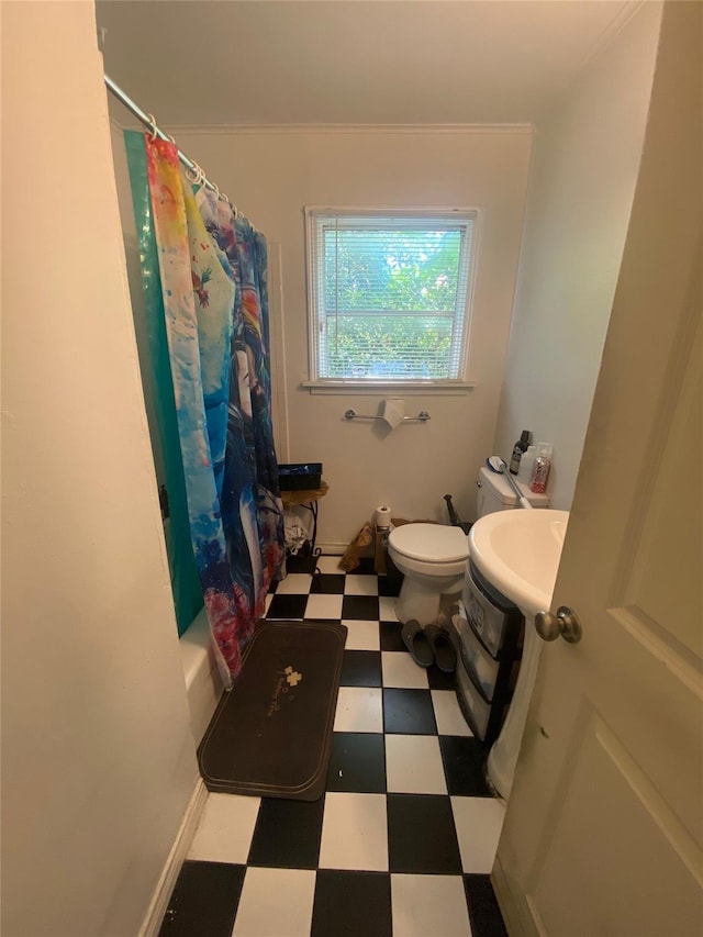 10721 Hermosa Dr, Dallas, TX 75218 - full bath with tile patterned floors, toilet, and a shower with shower curtain