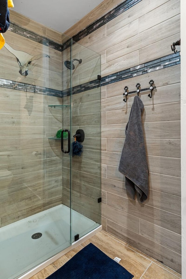 full bathroom featuring a stall shower