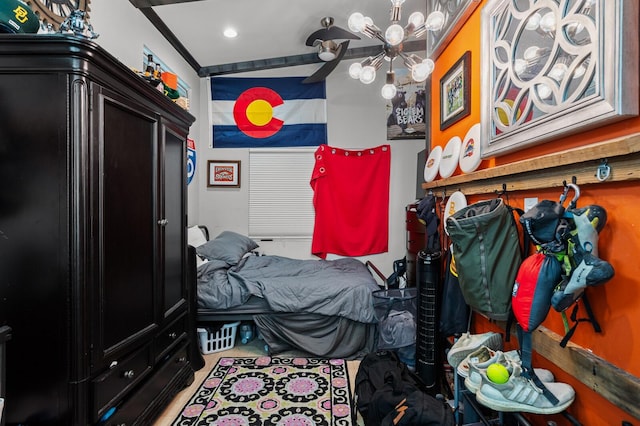 bedroom featuring recessed lighting and an inviting chandelier