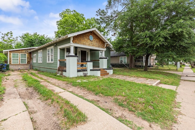 view of front of home featuring covered porch
