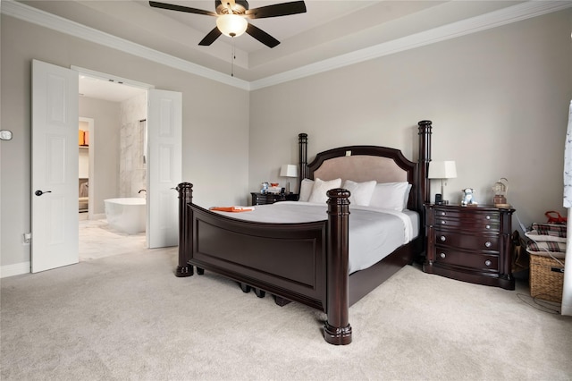 2308 Topaz Dr, Rockwall, TX 75087 - bedroom featuring ornamental molding, baseboards, light colored carpet, connected bathroom, and a ceiling fan