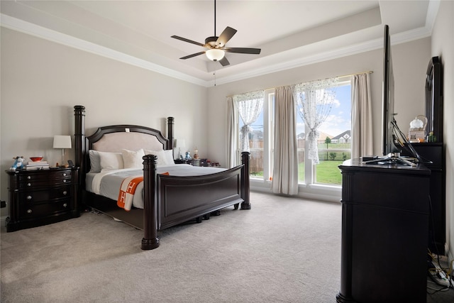 2308 Topaz Dr, Rockwall, TX 75087 - bedroom with crown molding, ceiling fan, light carpet, and a tray ceiling