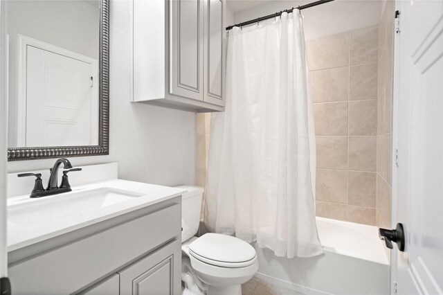 2308 Topaz Dr, Rockwall, TX 75087 - full bathroom with toilet, shower / bath combination with curtain, and vanity