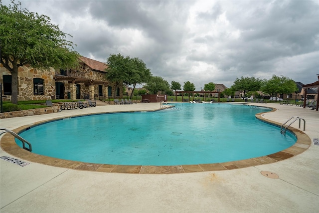 2308 Topaz Dr, Rockwall, TX 75087 - pool with a patio area and fence