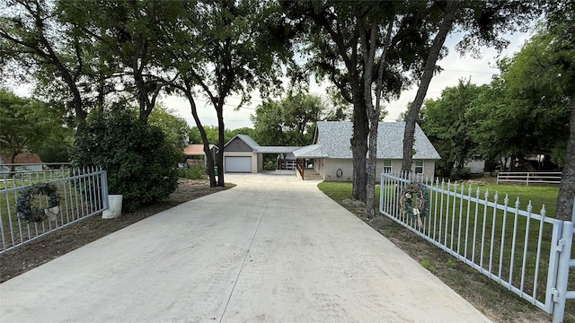 407 S Lakewood Cir, Lake Bridgeport, TX 76426 - view of front of house with a garage and driveway