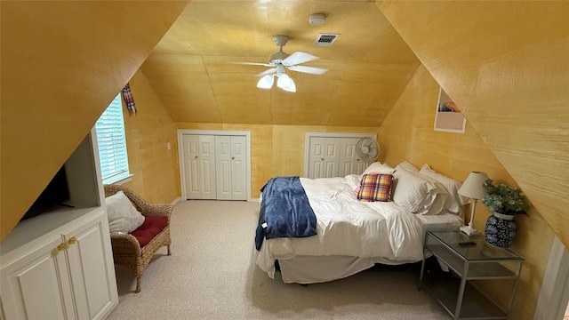 407 S Lakewood Cir, Lake Bridgeport, TX 76426 - bedroom featuring vaulted ceiling, carpet flooring, multiple closets, a ceiling fan, and baseboards