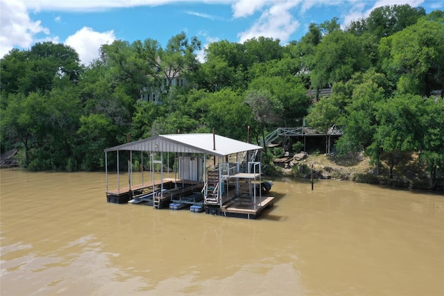 407 S Lakewood Cir, Lake Bridgeport, TX 76426 - dock area featuring a water view, boat lift, and view of scattered trees