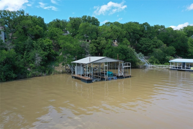 407 S Lakewood Cir, Lake Bridgeport, TX 76426 - dock area with a water view and boat lift