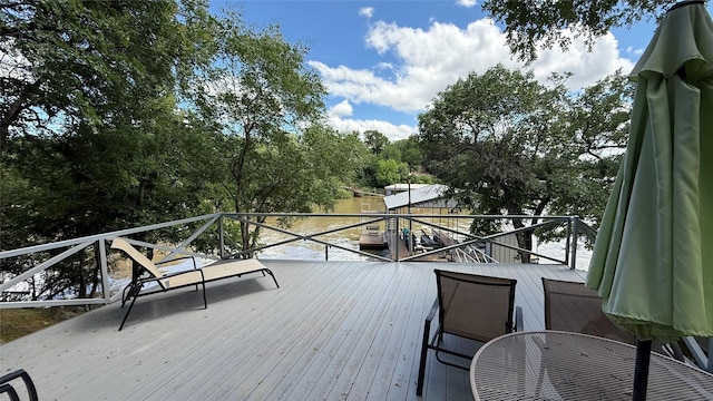 407 S Lakewood Cir, Lake Bridgeport, TX 76426 - deck with view of wooded area