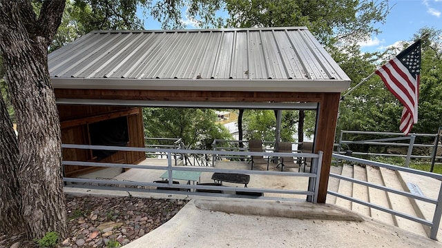 407 S Lakewood Cir, Lake Bridgeport, TX 76426 - dock area featuring a water view, view of scattered trees, stairway, and boat lift
