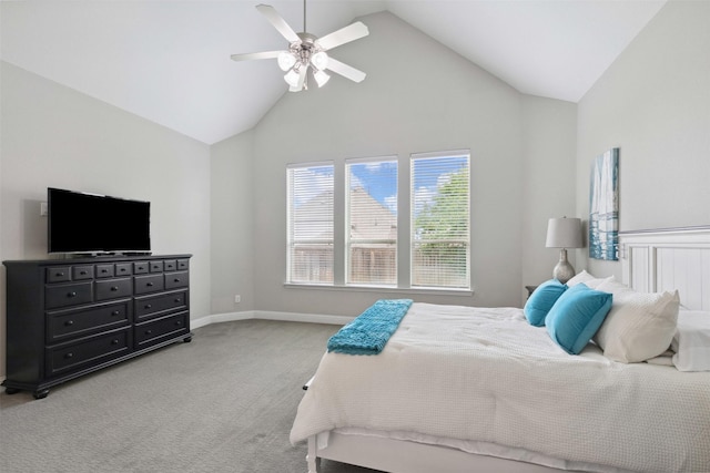 bedroom featuring baseboards, a ceiling fan, high vaulted ceiling, and light carpet