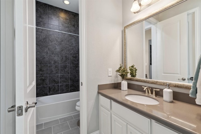 full bath with vanity, washtub / shower combination, tile patterned flooring, and toilet