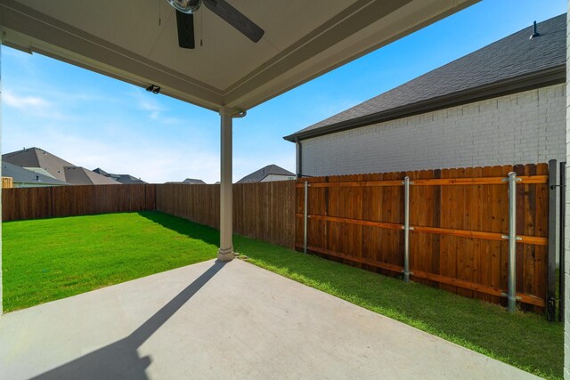 view of patio featuring a fenced backyard and ceiling fan