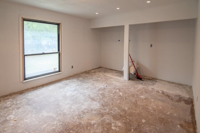 empty room featuring recessed lighting
