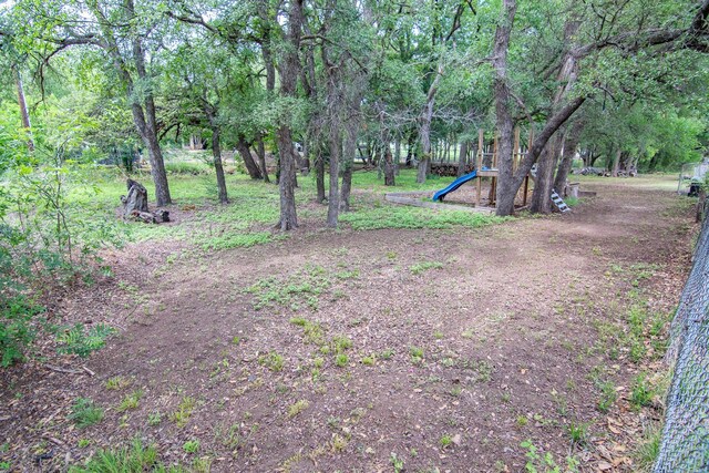 view of yard with a playground