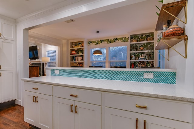 1635 Taft St, Dallas, TX 75208 - kitchen with open shelves, white cabinetry, and visible vents
