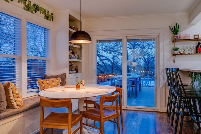 1635 Taft St, Dallas, TX 75208 - dining space with ornamental molding, plenty of natural light, and wood finished floors