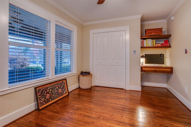 1635 Taft St, Dallas, TX 75208 - bedroom featuring ornamental molding, baseboards, a closet, and wood finished floors