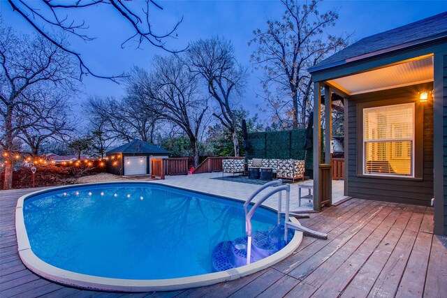 1635 Taft St, Dallas, TX 75208 - view of pool with a fenced backyard, a wooden deck, a fenced in pool, and an outbuilding