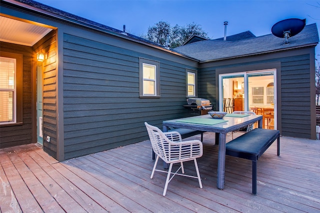 1635 Taft St, Dallas, TX 75208 - wooden deck with area for grilling and outdoor dining area