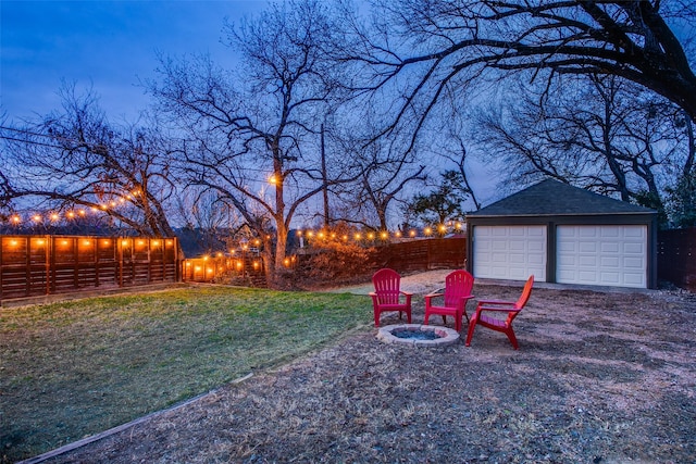 1635 Taft St, Dallas, TX 75208 - view of yard featuring a fire pit, an outbuilding, fence, and a garage