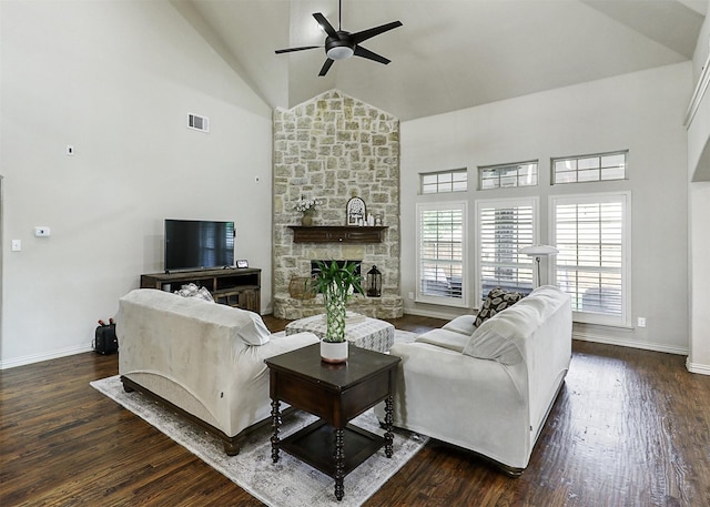 living area featuring visible vents, wood finished floors, baseboards, high vaulted ceiling, and a ceiling fan