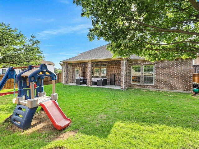 exterior space with a yard, fence, an outdoor hangout area, and a patio area