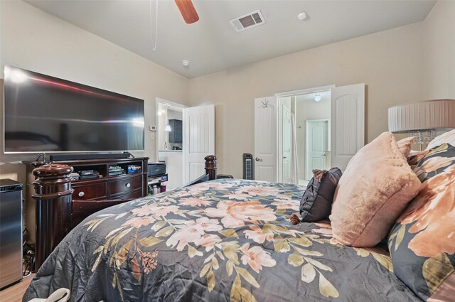 bedroom featuring visible vents and ceiling fan