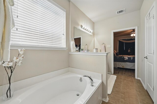 full bath with visible vents, a garden tub, ensuite bath, and tile patterned floors