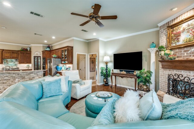 living area featuring recessed lighting, ceiling fan, and visible vents
