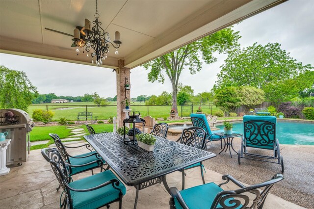 view of patio featuring a fenced backyard, a fenced in pool, a grill, and outdoor dining space