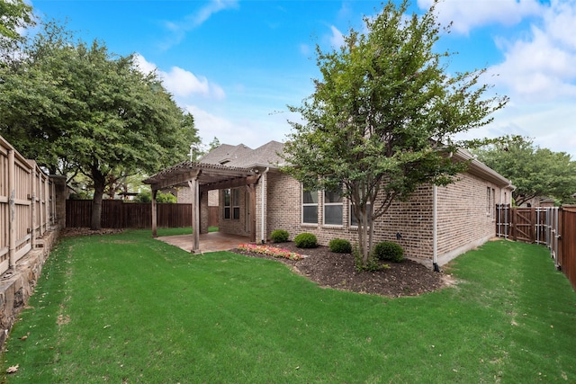 back of property with a lawn, a patio area, brick siding, a fenced backyard, and a pergola