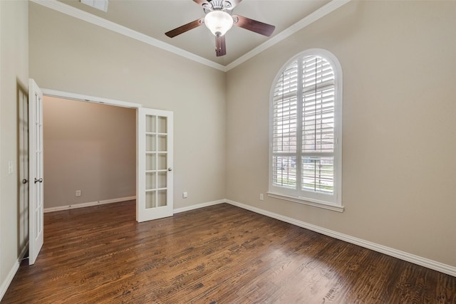 unfurnished room with ornamental molding, wood finished floors, baseboards, french doors, and a ceiling fan
