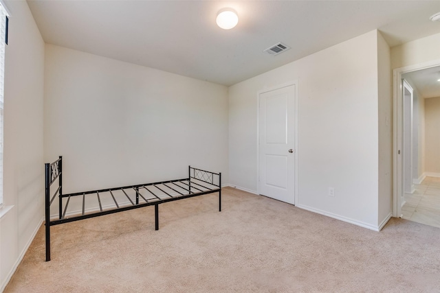 850 Levi Ln, Forney, TX 75126 - unfurnished bedroom featuring visible vents, carpet flooring, and baseboards