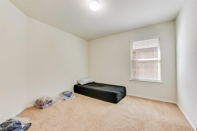 850 Levi Ln, Forney, TX 75126 - unfurnished bedroom featuring baseboards and carpet flooring