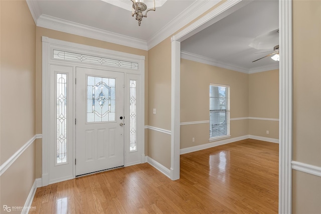 2320 Hidden Cv, Haughton, LA 71037 - entryway with crown molding, baseboards, ceiling fan with notable chandelier, and light wood finished floors